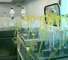 Laboratory table with vials and tubes.