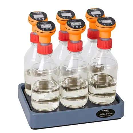 209 OECD 209 inhibition test showing activated sludge respiration measurement with oxygen probes in wastewater laboratory setup.